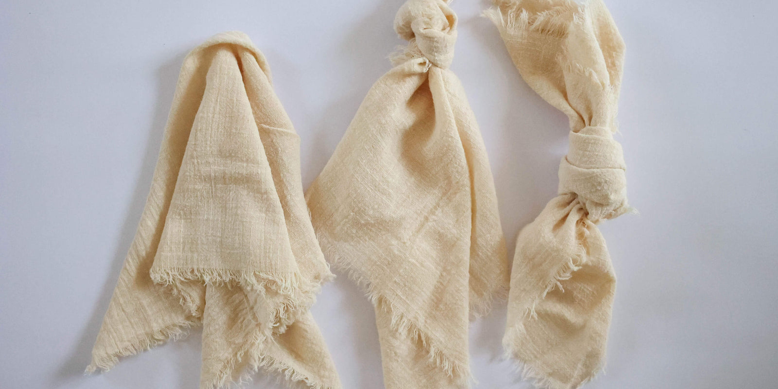 folded rustic cotton wedding napkins