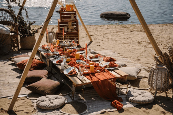 bohemian table setup by the beach, earthy colours