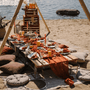 bohemian table setup by the beach, earthy colours