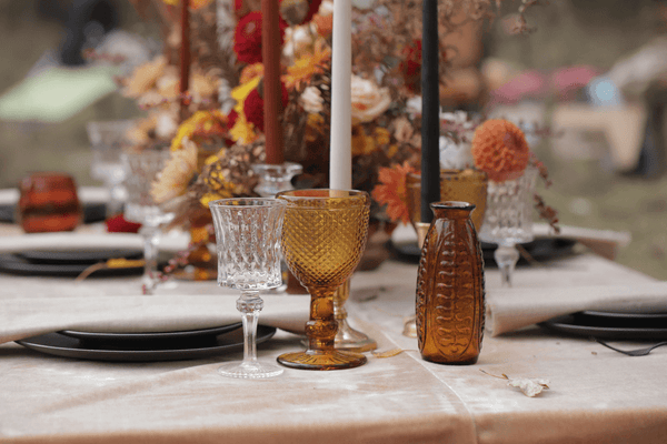 closeup of autumn-themed wedding tablescape