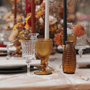 closeup of autumn-themed wedding tablescape
