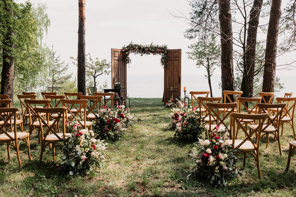 rustic wedding ceremony setup in outdoor garden
