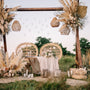  Bride and groom chair arrangement in boho style with organic decorations