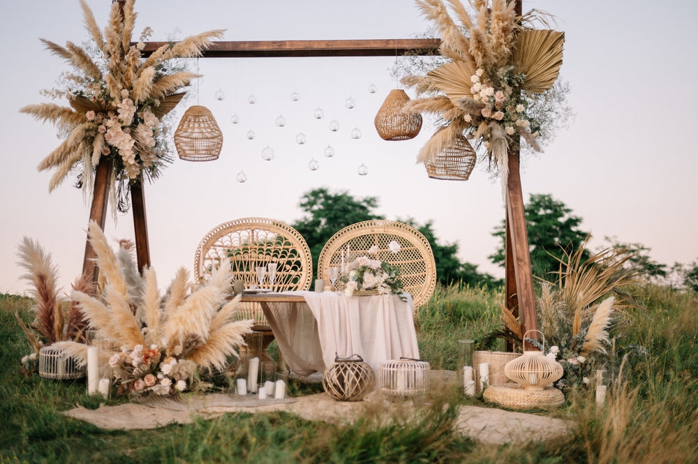  Bride and groom chair arrangement in boho style with organic decorations
