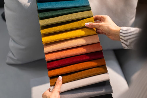woman choosing fabric colours