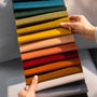 woman choosing fabric colours