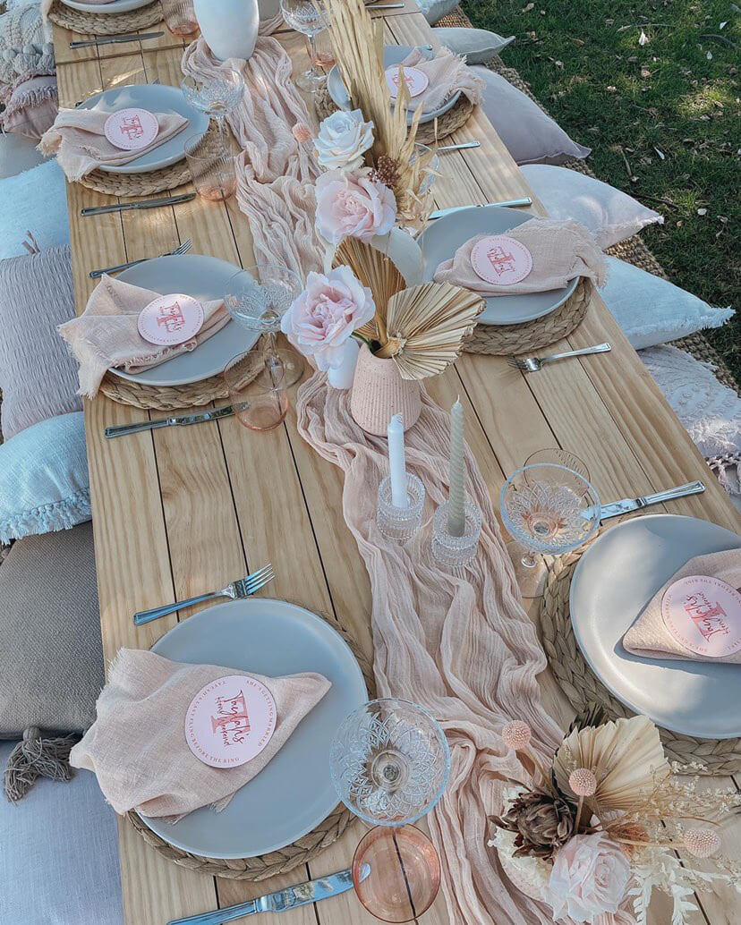 rustic table setting adorned by gauze table runner